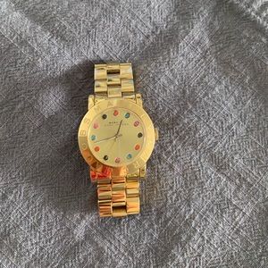 Marc Jacobs gold watch with multicoloured gems. Women’s sized for a small wrist.